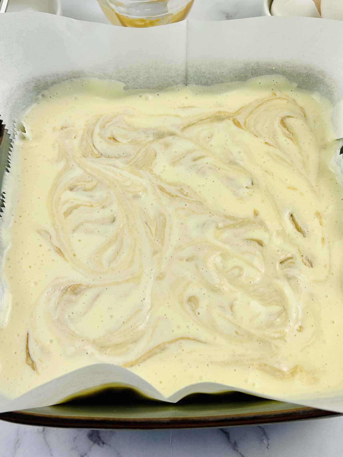Biscoff mixture swirled into cheesecake mixture.