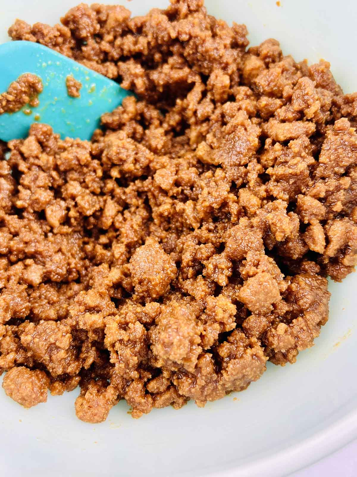 Mixed cookie crumbs and butter.