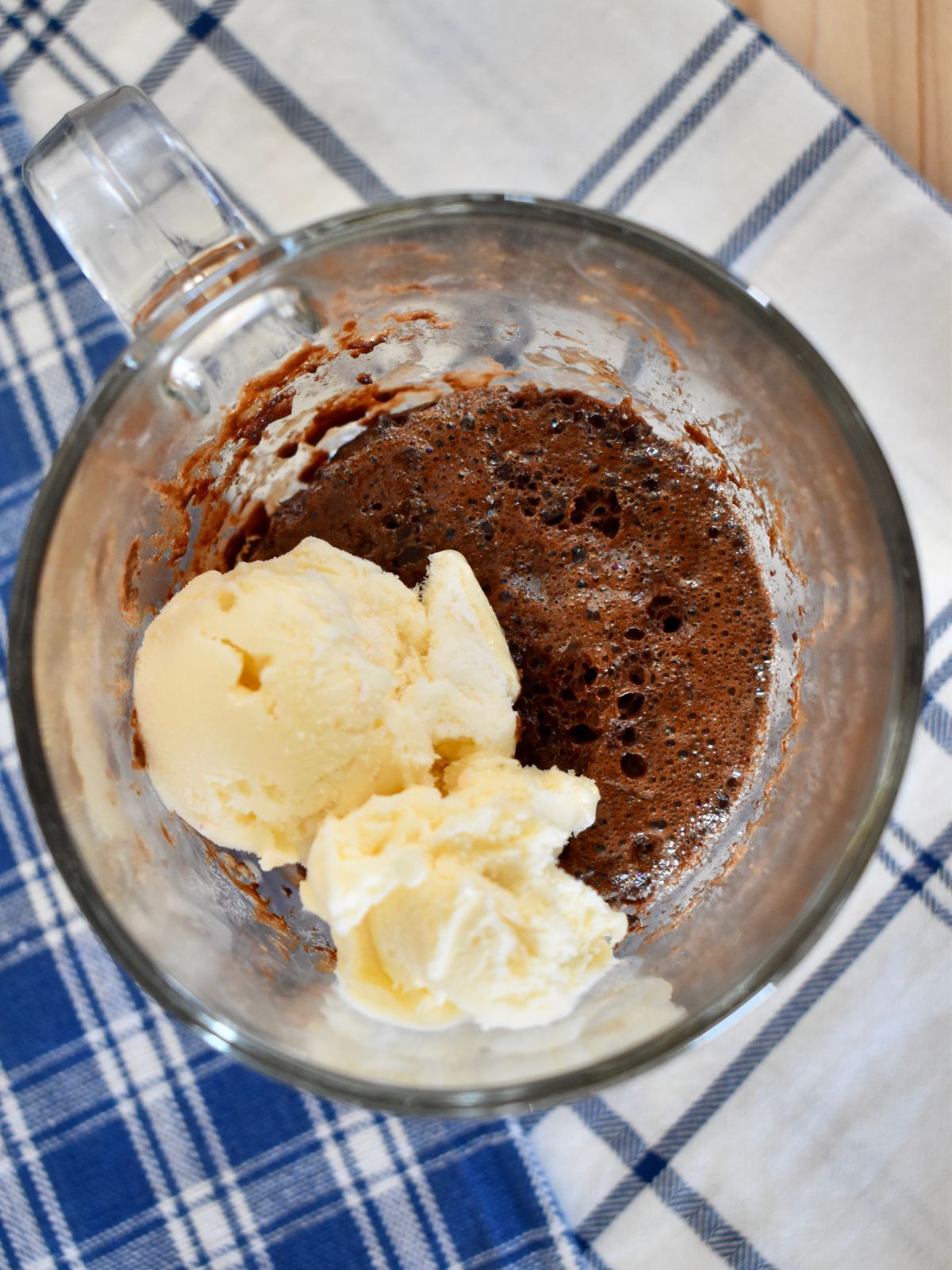 3 Ingredient Mug Cake with a scoop of vanilla ice cream. 