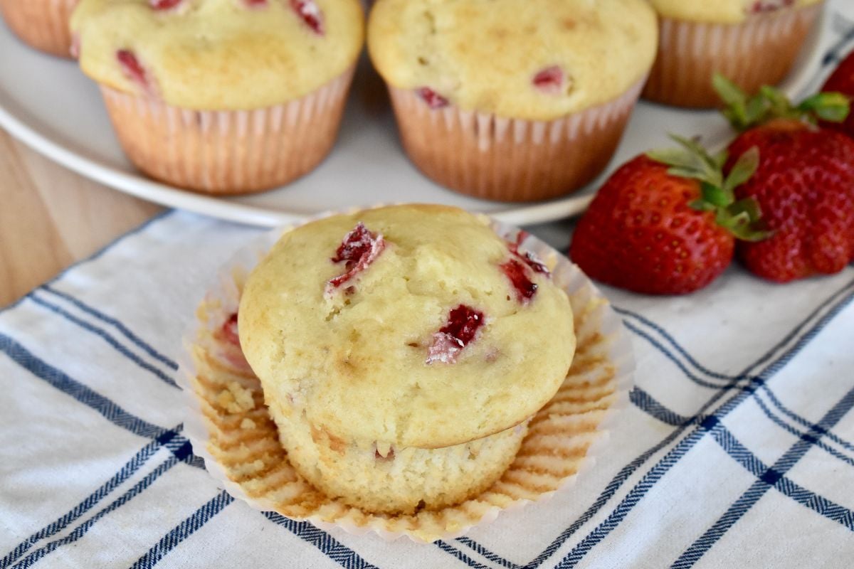 Strawberry Cream Cheese Muffin with paper cupcake liner removed. 