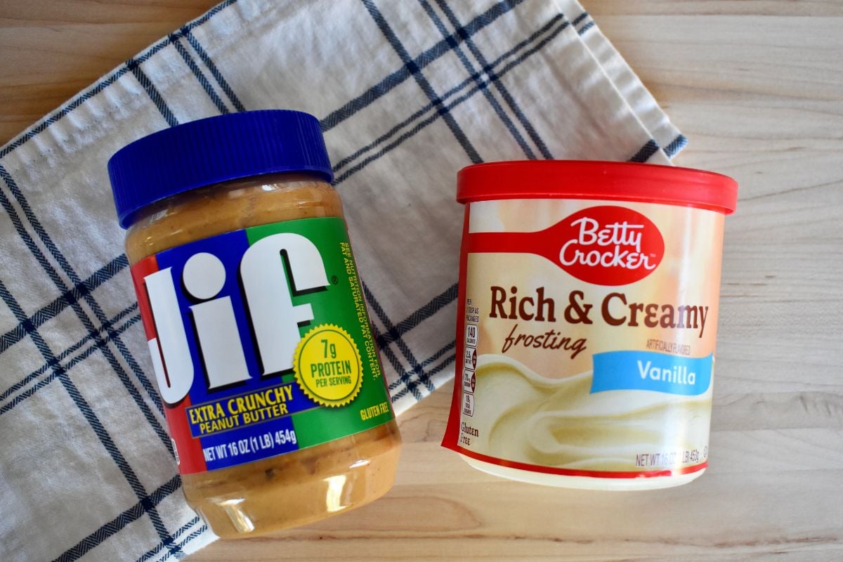 Jif and Betty Crocker frosting on a counter. 