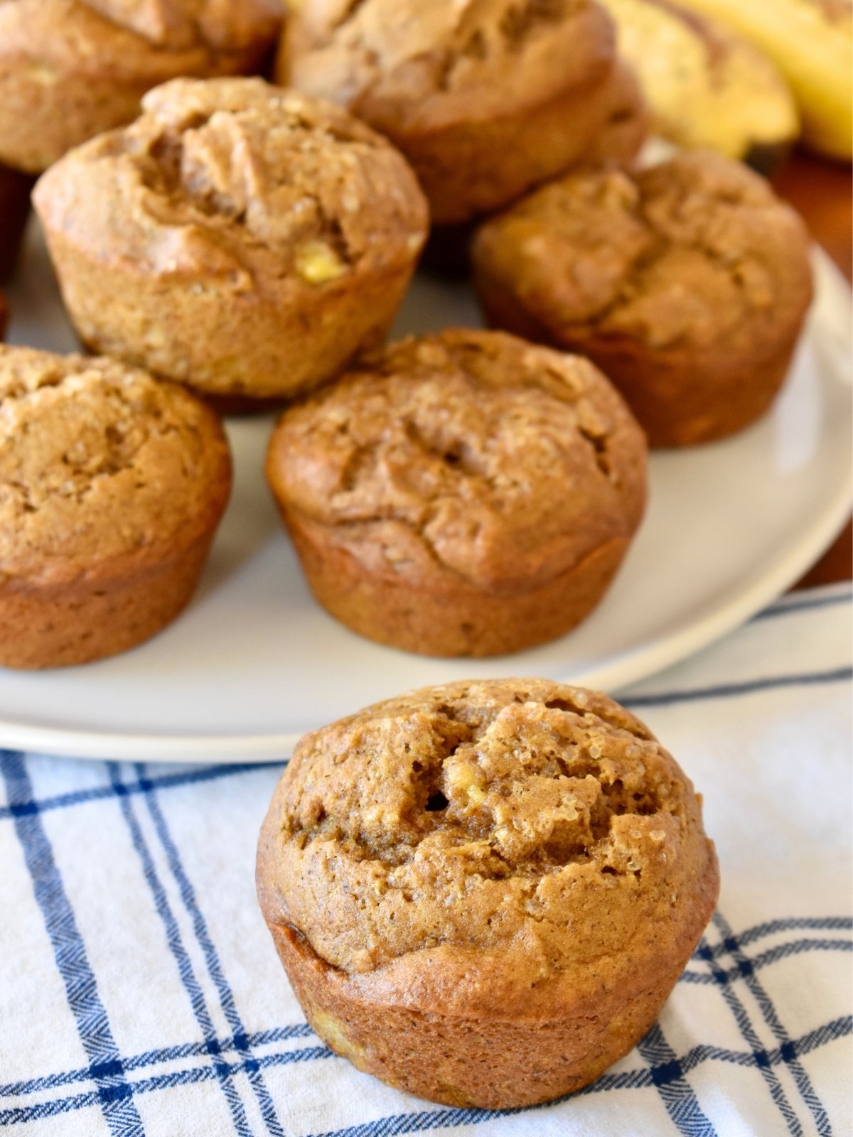 Pumpkin Banana Muffins on a white plate.