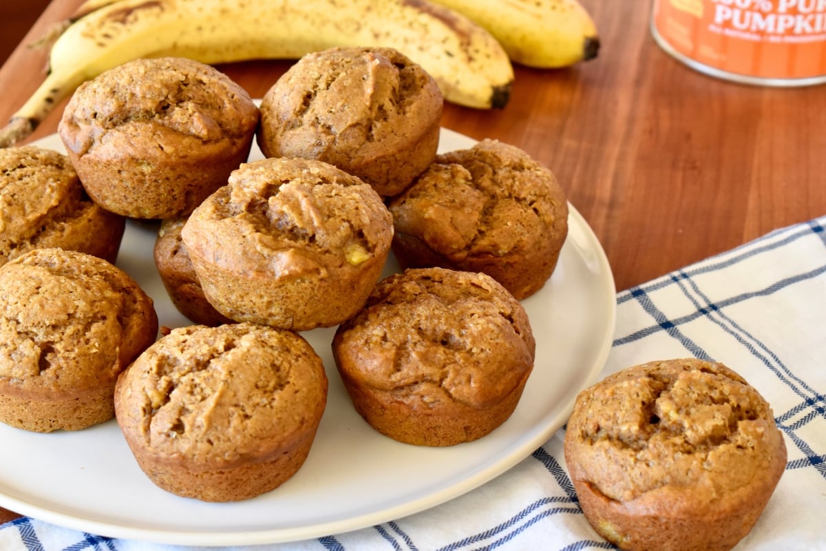 Pumpkin Banana Muffins on a white plate.